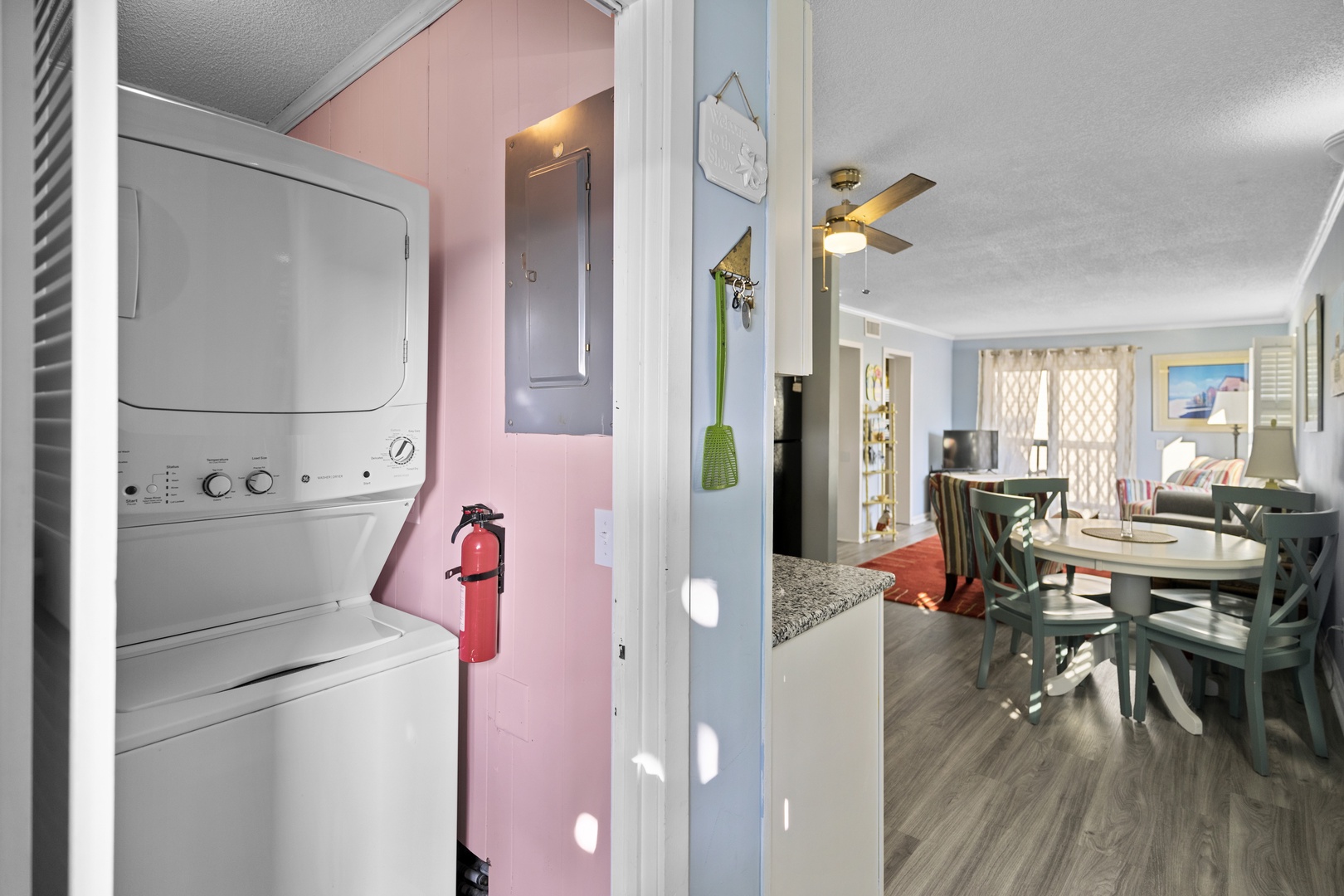 Your in-unit washer and dryer make extended stays effortless, while the open living space invites relaxation after beach days.