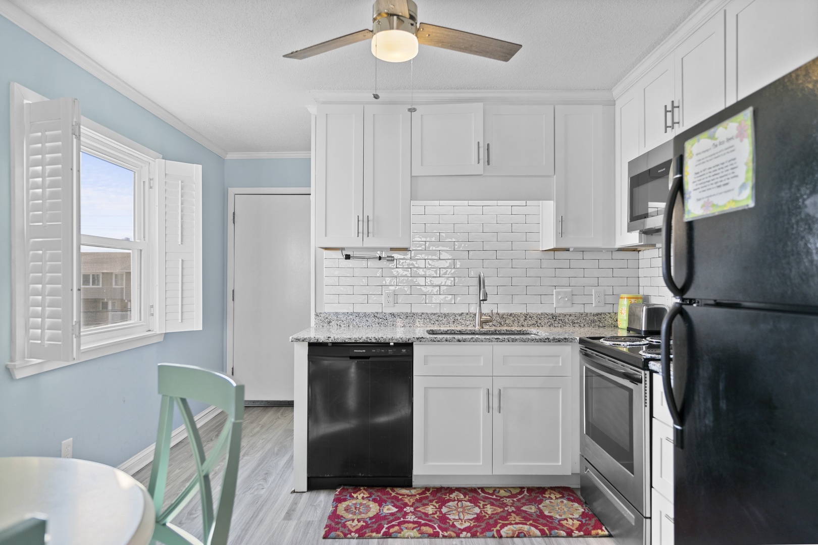 Your bright kitchen features modern appliances and a cozy breakfast nook for morning coffee.