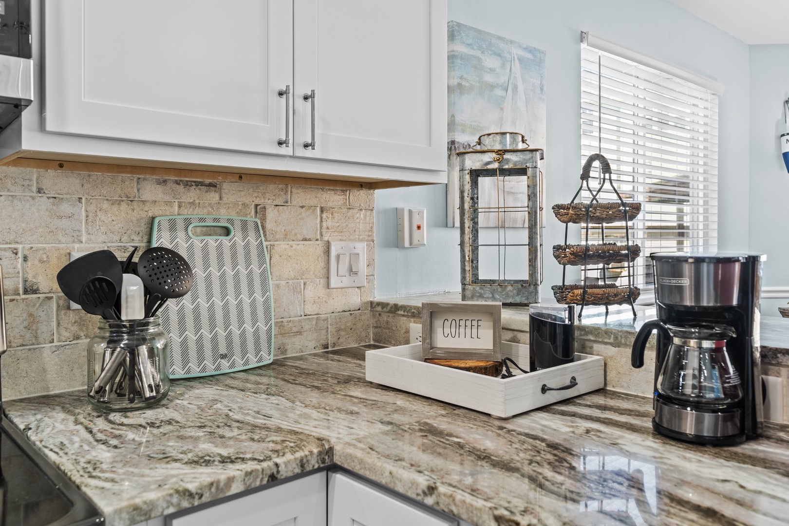 Start your mornings right in this beautifully appointed kitchen with granite countertops, premium appliances, and everything you need for perfect vacation breakfasts.