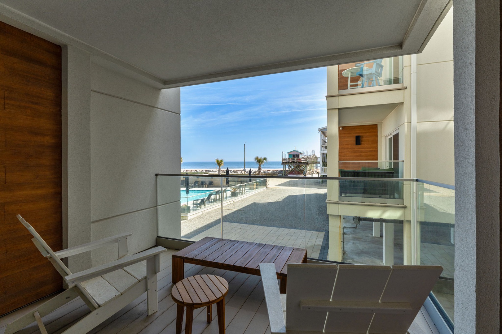 Step onto your private balcony for morning coffee while soaking up stunning ocean views and coastal breezes.