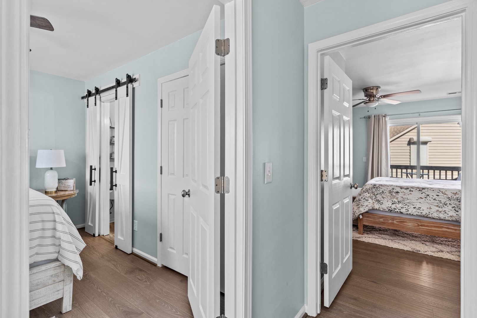 You'll love the calming coastal colors and sliding barn door that add charm to your private bedroom retreat.