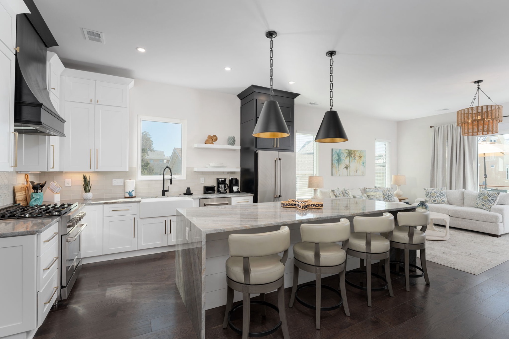 Your gourmet kitchen invites culinary adventures with gleaming countertops, modern appliances, and a spacious island perfect for morning coffee or evening gatherings.
