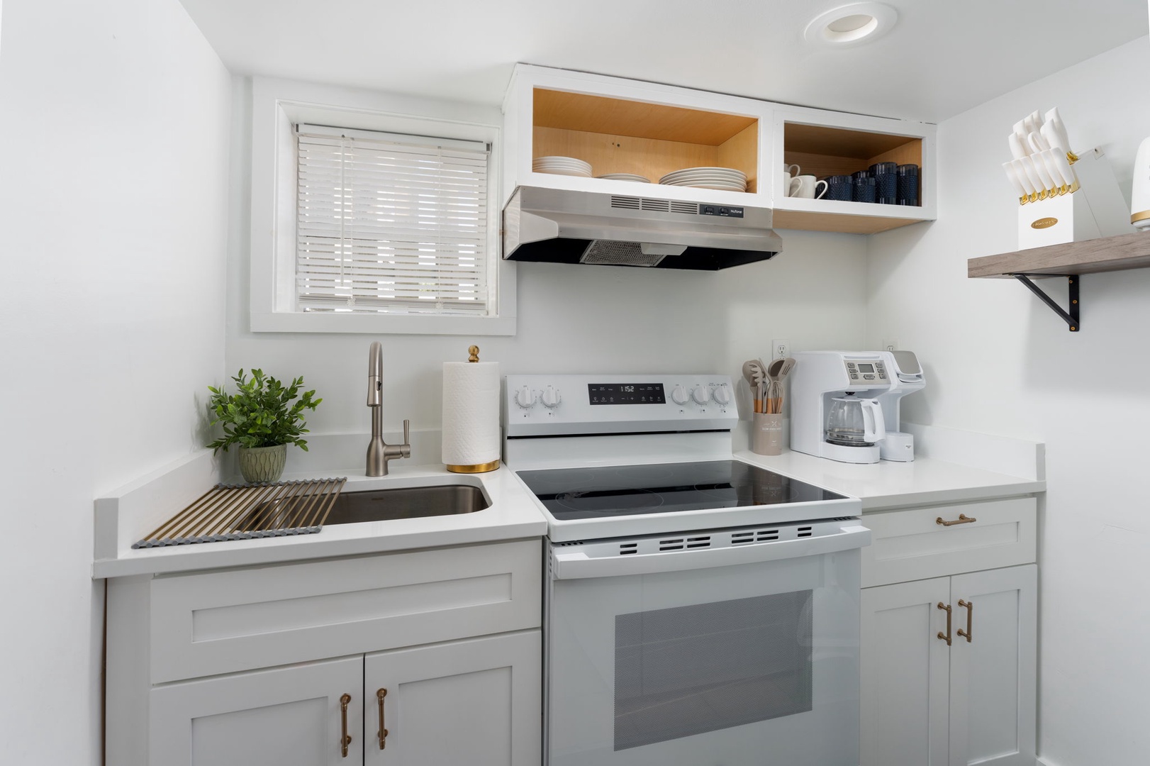 Your bright, fully-equipped kitchen invites you to prepare memorable meals with modern appliances and thoughtful touches.