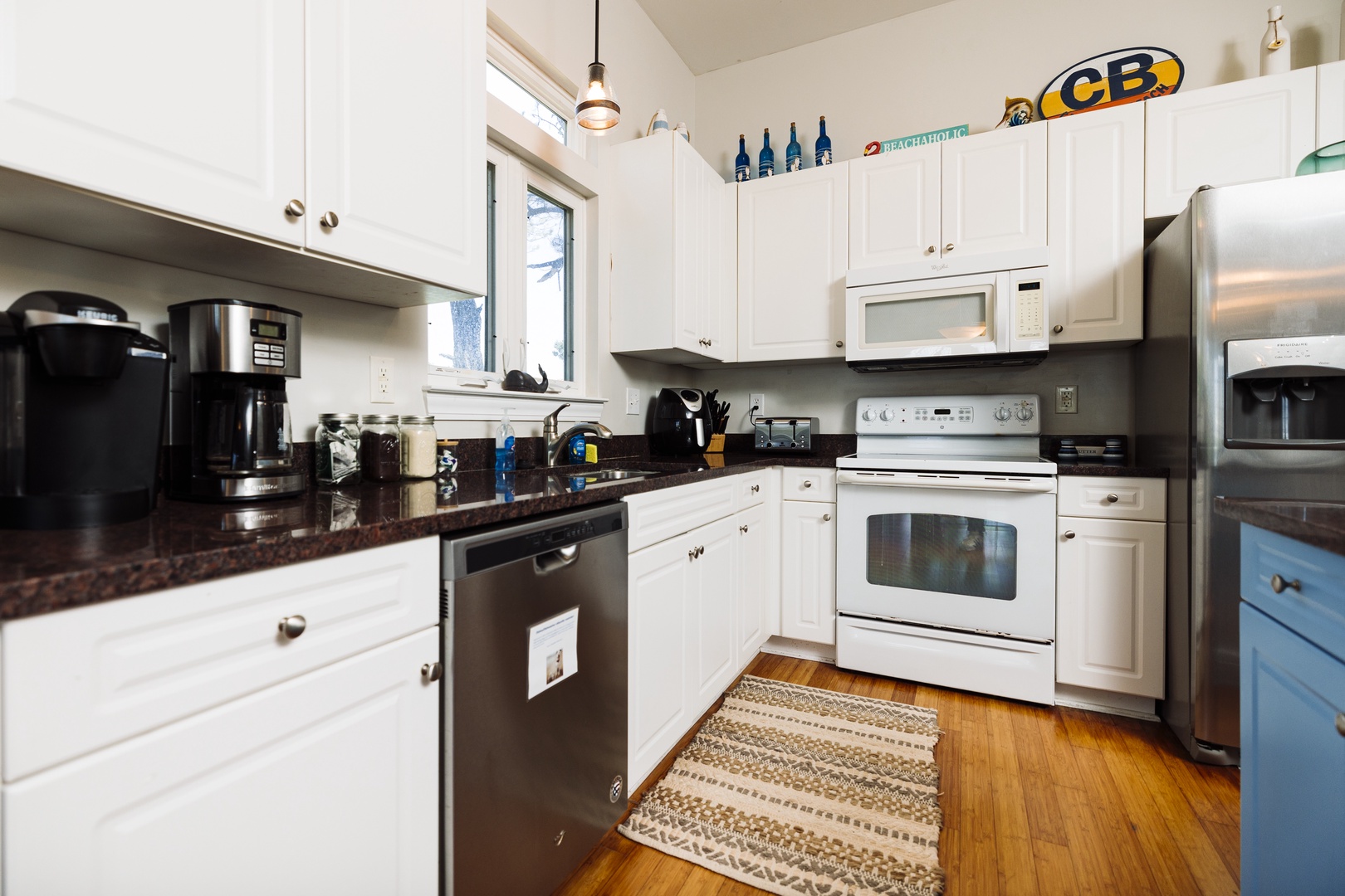 Your fully equipped kitchen awaits with granite counters, stainless appliances, and everything you need to create memorable meals during your stay.