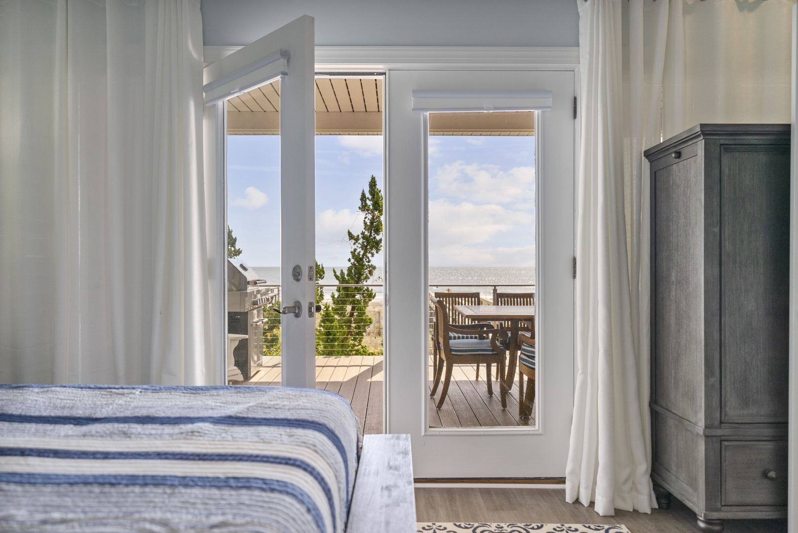 Wake up to stunning views from your private bedroom, with French doors opening to your own balcony and dining space overlooking the coastline.