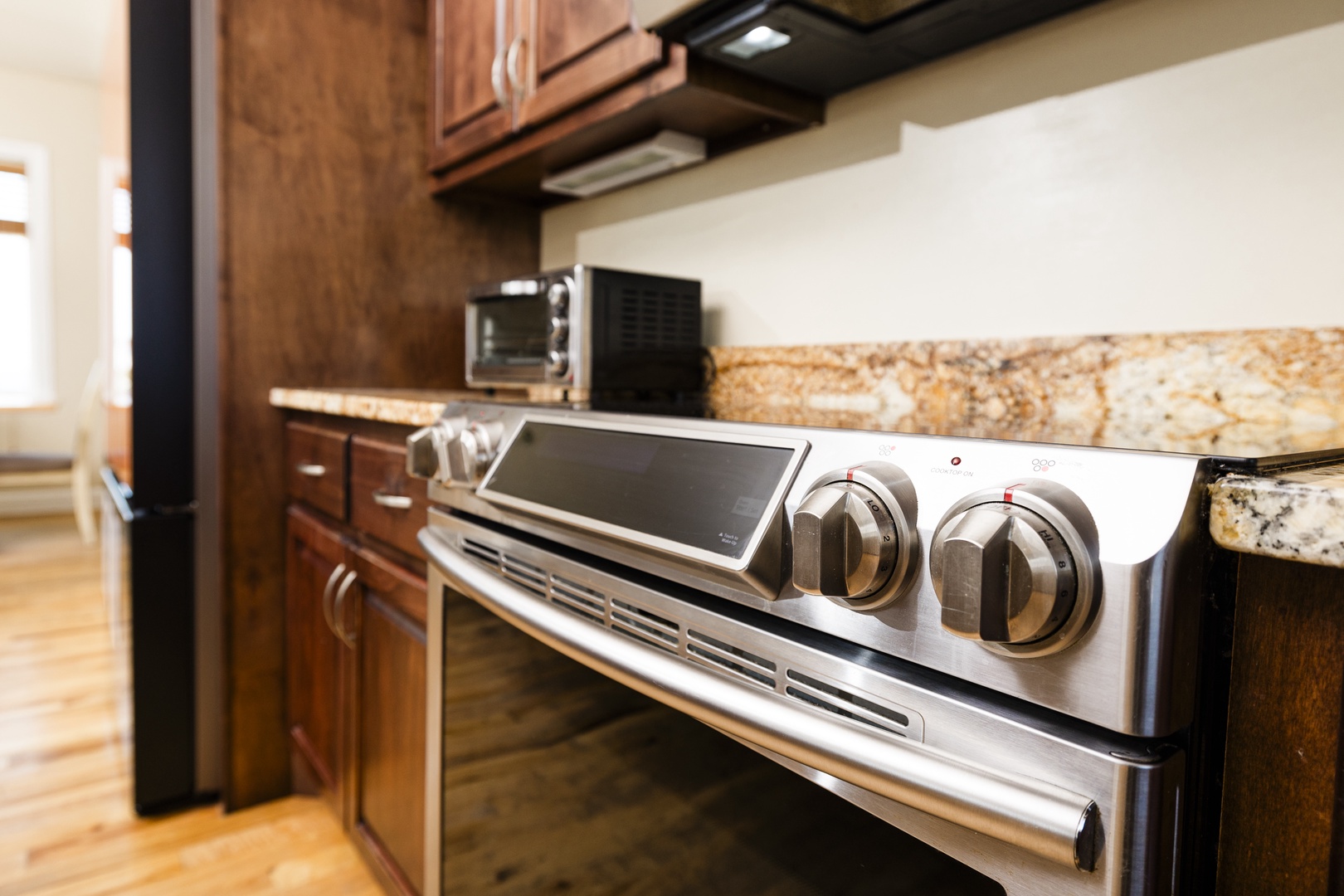 Your fully equipped kitchen features stainless steel appliances and granite countertops, ready for preparing memorable meals during your stay.