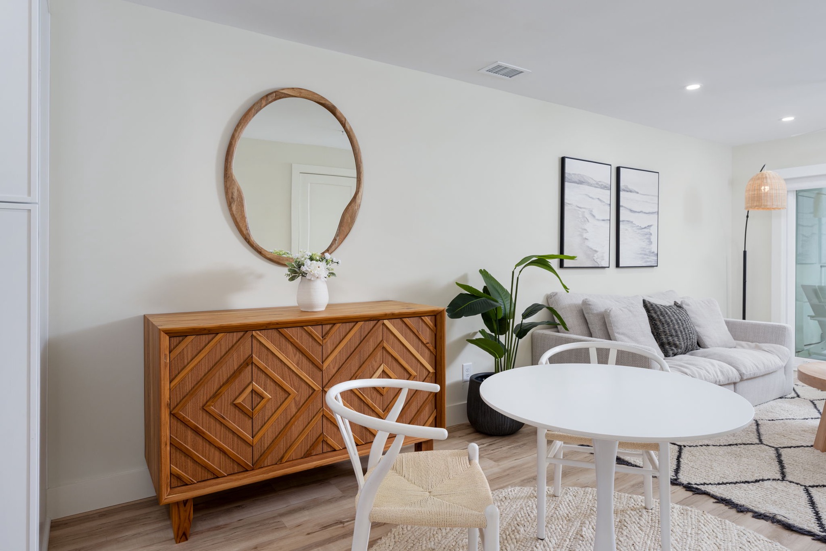 Relax in this beautifully designed living space with stylish furniture, warm wood tones, and thoughtful touches that make you feel instantly at home.