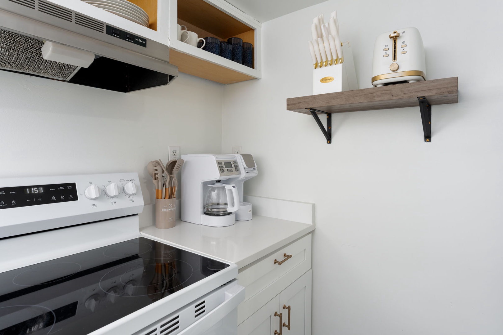 Your fully equipped kitchen has everything you need, from morning coffee to home-cooked meals with modern appliances and thoughtful storage.