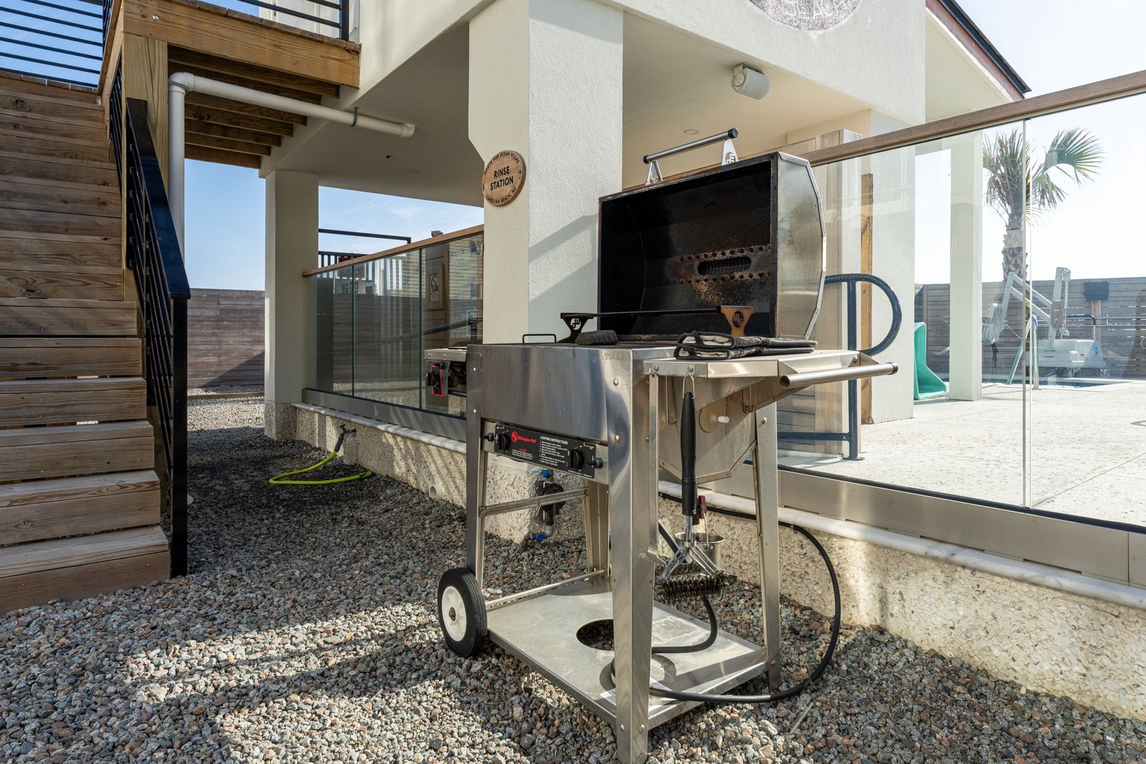 Fire up your vacation meals with this premium BBQ station, ready for rooftop grilling sessions under sunny skies.