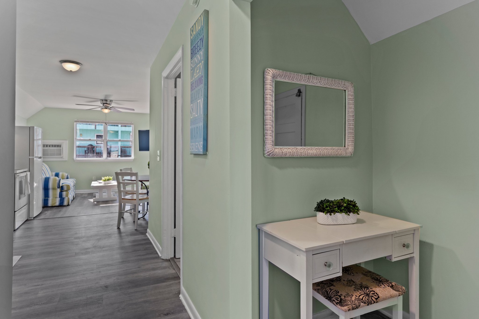 Step into your coastal-inspired home where soothing sea-glass walls and thoughtful touches create the perfect retreat for relaxation.