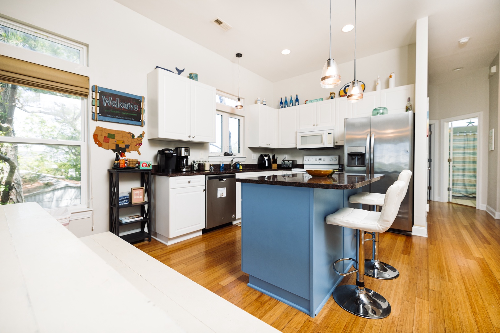 Your fully equipped kitchen features modern appliances, a welcoming island with bar seating, and everything you need to create memorable meals during your stay.