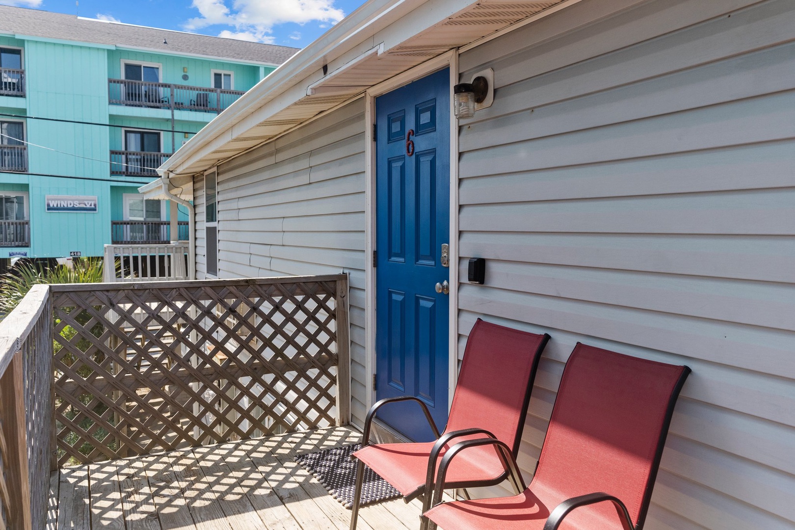 Unwind on your private deck with comfortable seating, perfect for morning coffee or evening relaxation.