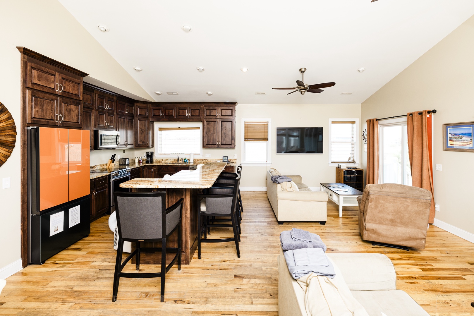 Your open kitchen flows seamlessly into the living area, creating perfect space for cooking and relaxing together.