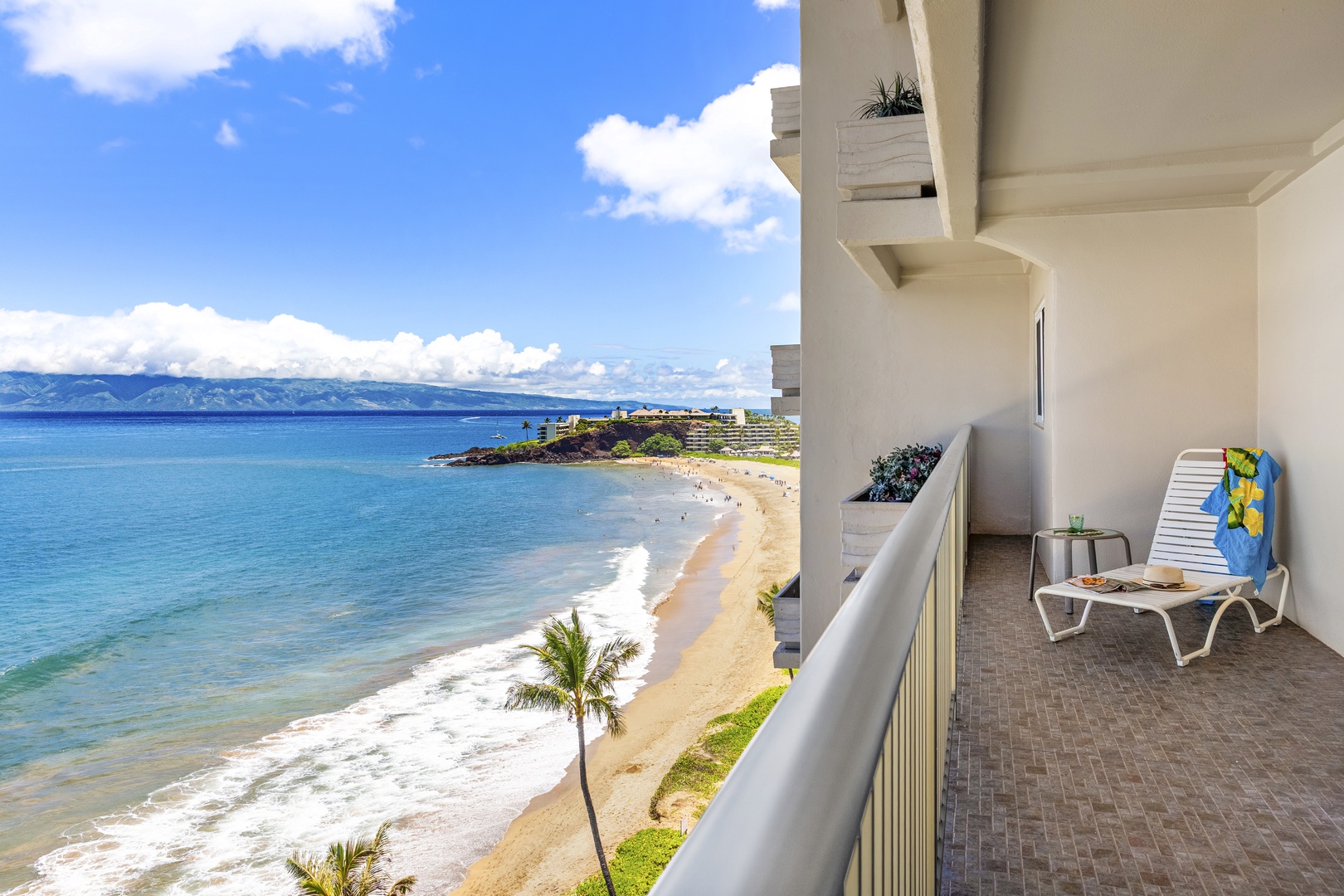 Relax on your private balcony with breathtaking ocean views, soft sea breezes, and golden sands just steps away—paradise awaits right outside your door.