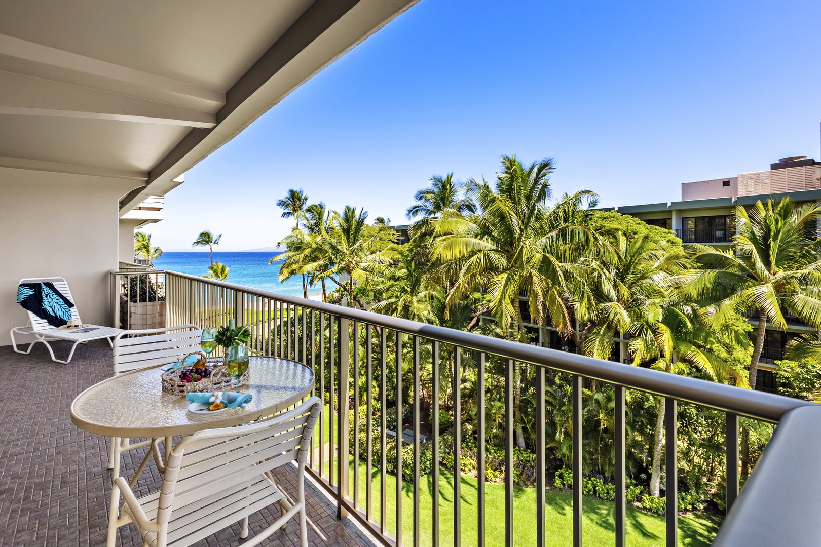 Unwind on your private balcony with breathtaking ocean views, where morning coffee tastes better with endless blue waters stretching before you.