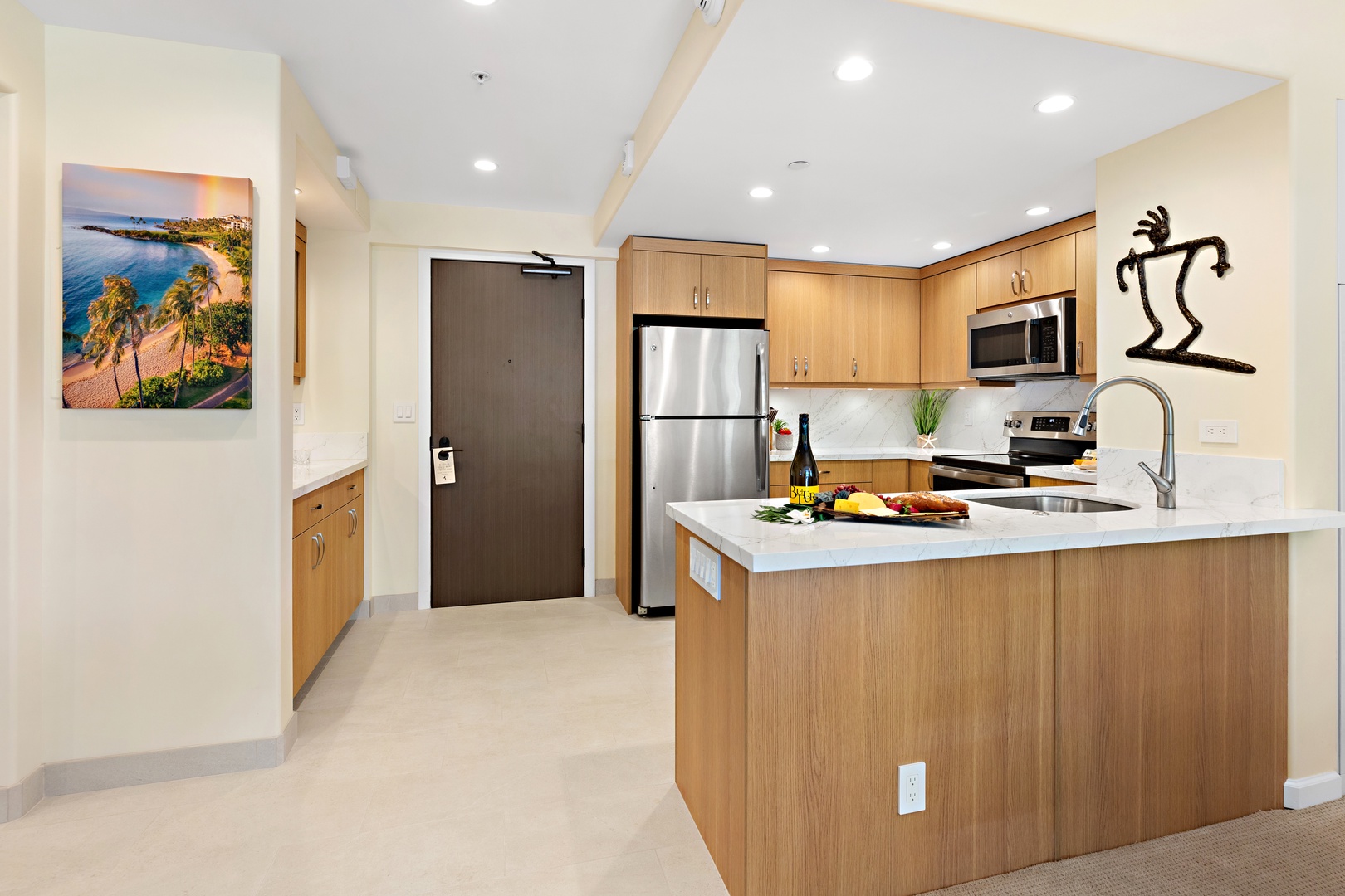 Cook with ease in a thoughtfully designed, fully equipped kitchen. Featuring modern appliances, ample counter space, and all the essentials you need, from quick island breakfasts to full home-cooked dinners.