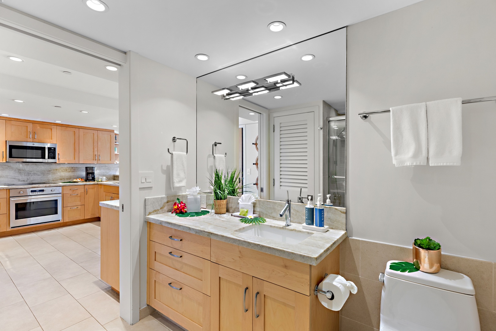 Refresh in your bright, spa-inspired bathroom with natural light, modern fixtures, and a spacious vanity. Clean towels await after your shower.