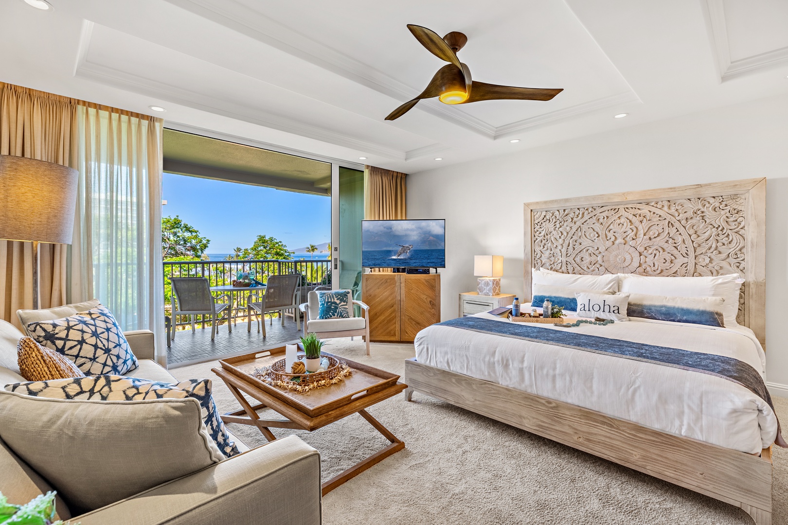 Wake up to stunning ocean views from your elegant suite, where tropical breezes and sophisticated island design invite relaxation. Your private balcony overlooks swaying palms and sparkling blue waters beyond.
