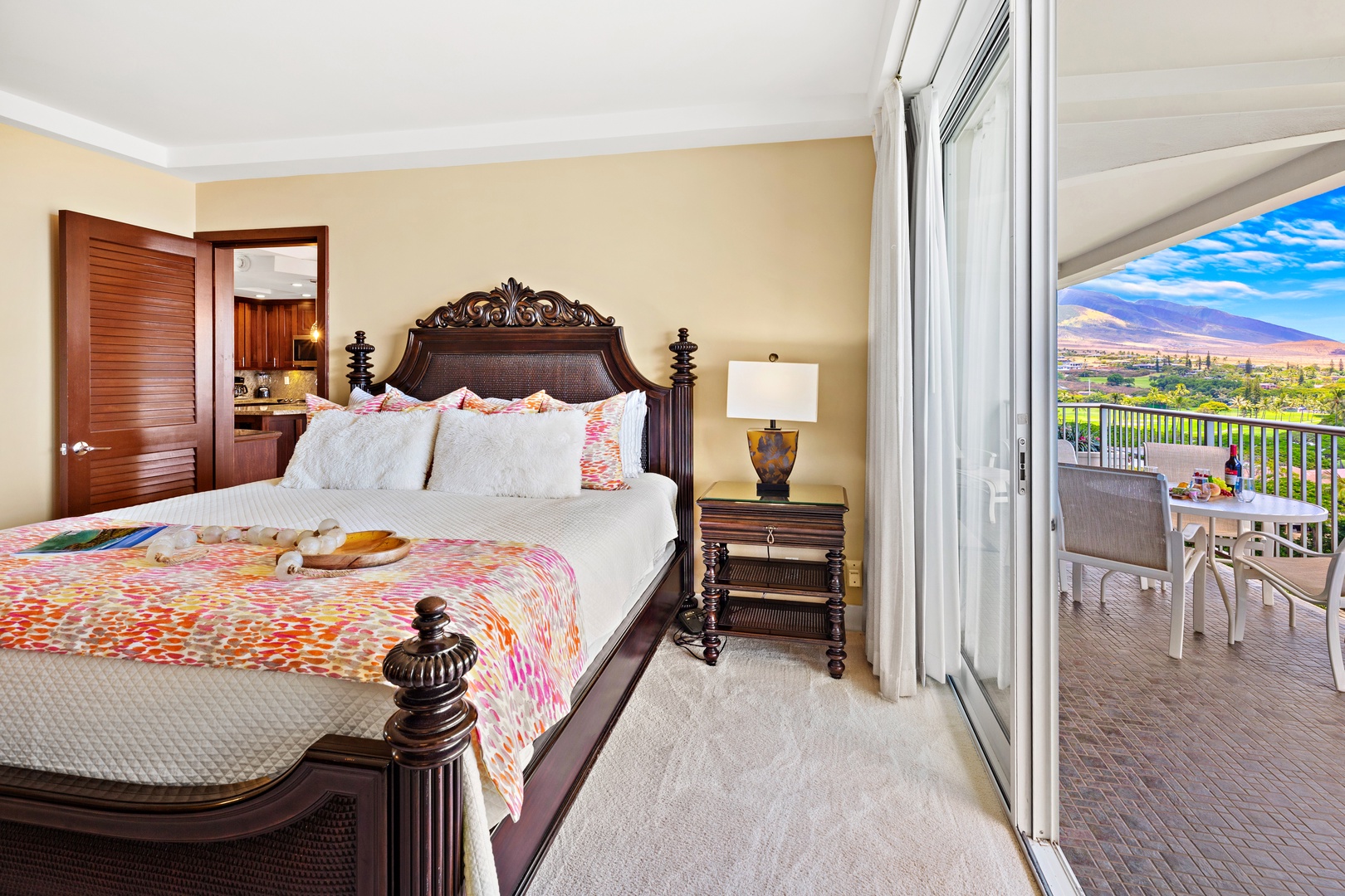 Wake up to island sunshine and step onto your private balcony, where sweeping mountain and valley views invite you to savor morning coffee in paradise.