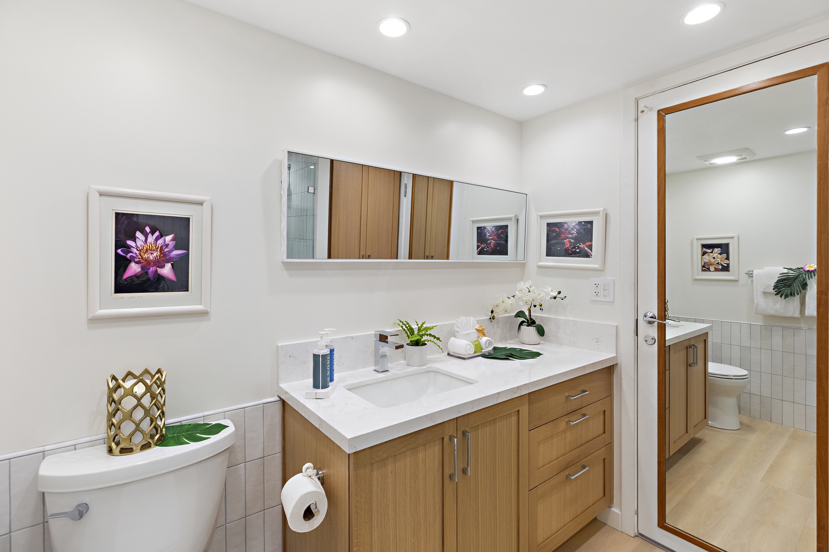 Step into your private sanctuary with light wood cabinetry and fresh white surfaces that invite you to unwind. Every detail is designed for your comfort.