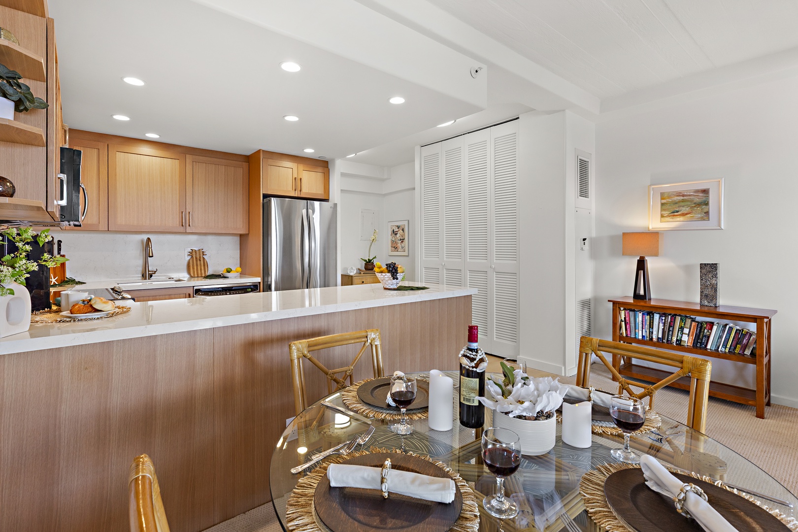 Your open-concept kitchen and dining area invites you to enjoy home-cooked meals in bright, welcoming style, with modern appliances and warm wood tones throughout.