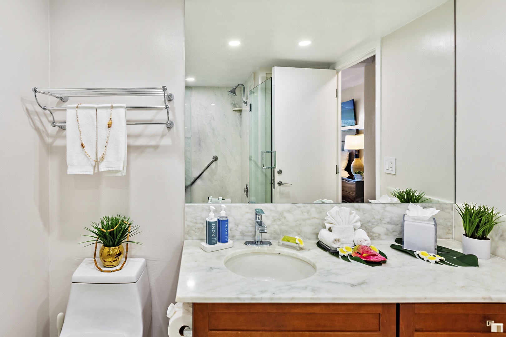 Elevated comfort and thoughtful design. A beautifully appointed guest bathroom featuring a spacious vanity and refined finishes that bring a touch of island luxury to your everyday routine.