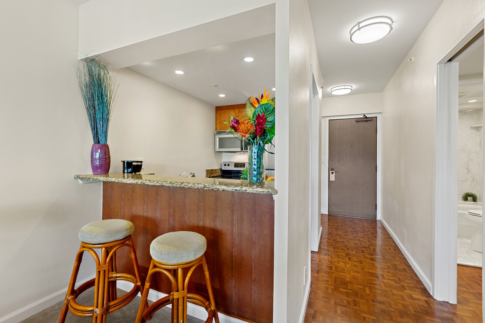 Your gourmet kitchen awaits with cabinetry, counters, and stainless-steel appliances. Perfect for preparing memorable meals together.