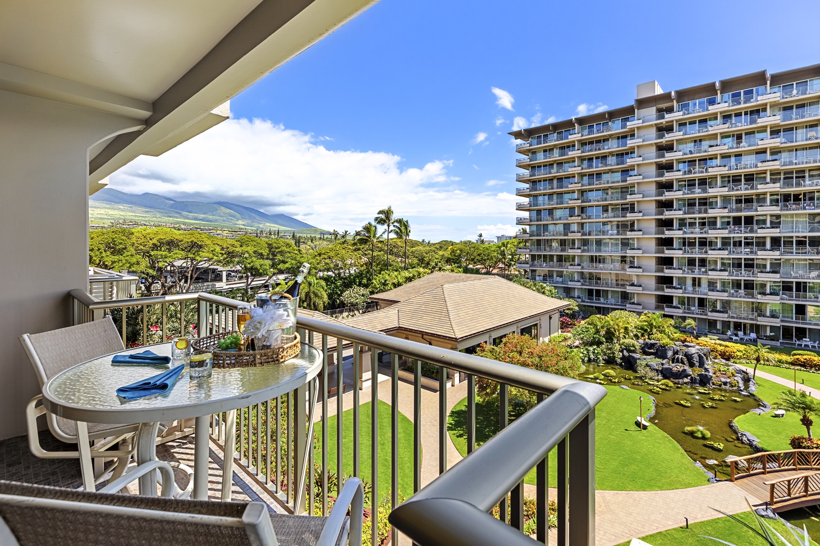Step onto your private balcony where sweeping mountain vistas and tropical gardens create the perfect backdrop for morning coffee or sunset drinks.