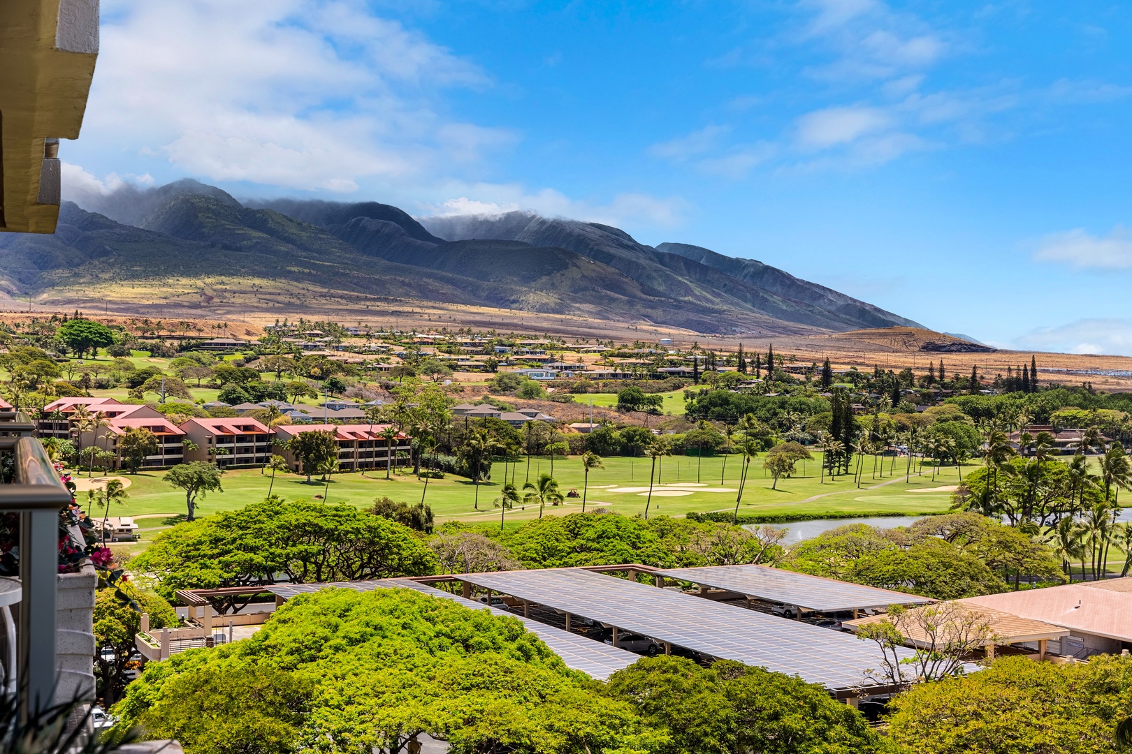 Serene mountain views right from your private balcony. Unwind in comfortable outdoor seating as the island’s lush peaks and golden skies create the perfect peaceful escape.