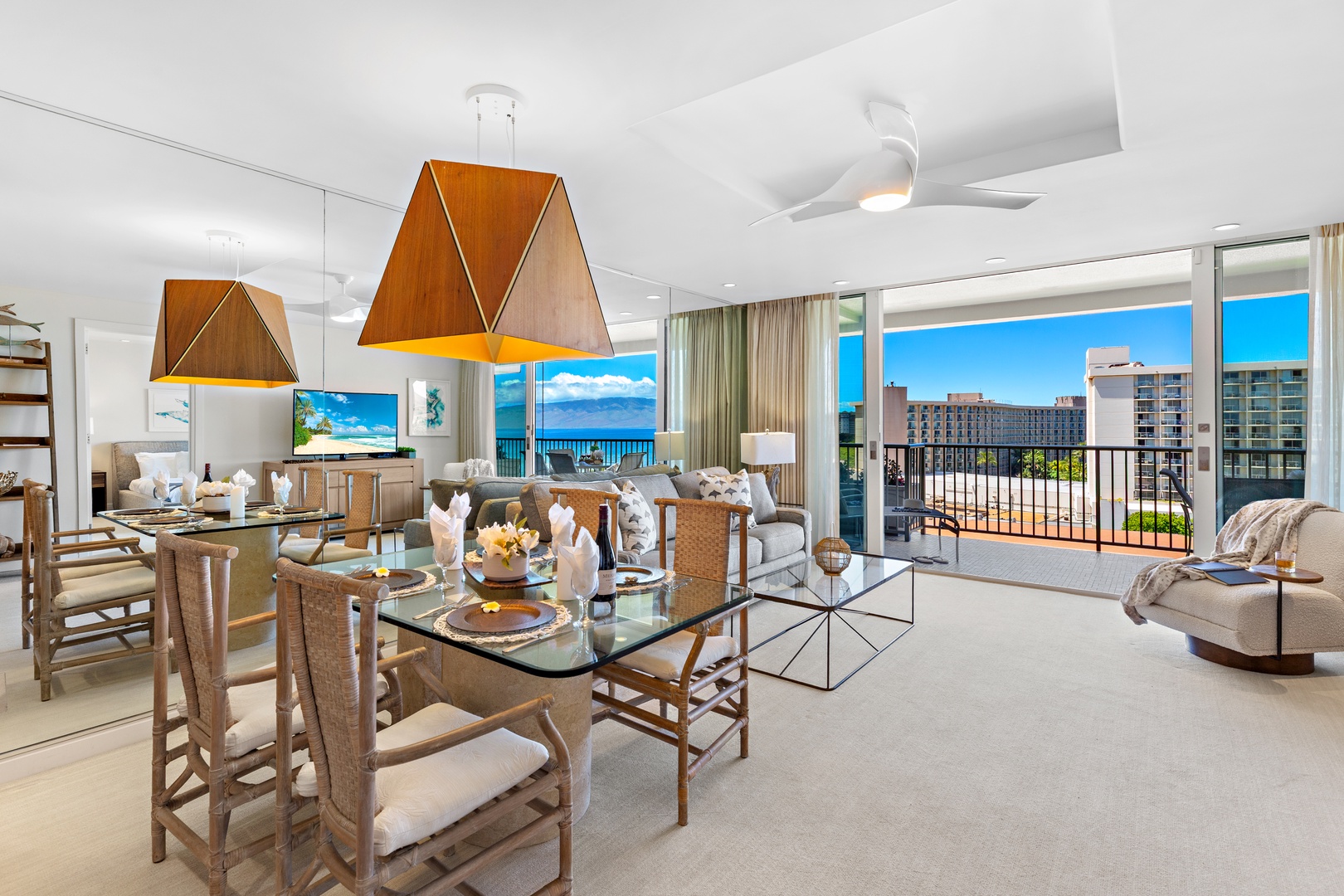 Bright, open living space flows seamlessly from dining to lounge, offering stunning ocean views through floor-to-ceiling windows. Your private balcony invites you to soak in the tropical breeze and coastal scenery.