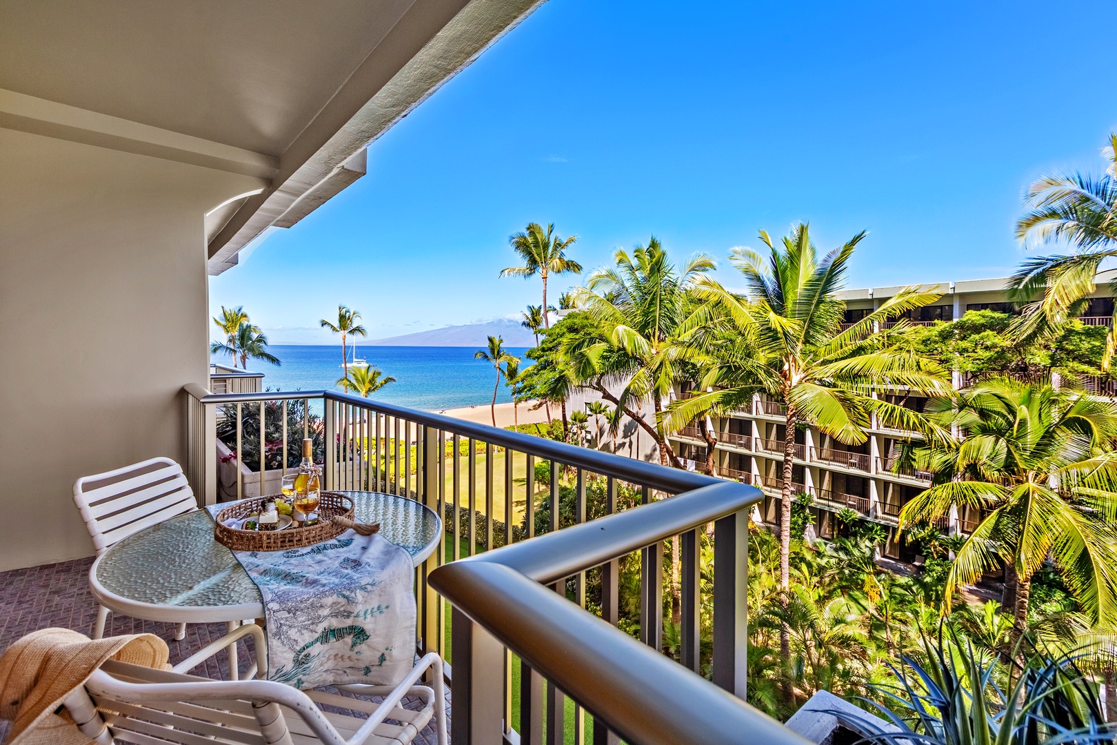 Sip your favorite beverage on your private balcony while soaking in breathtaking ocean views and watching the waves dance below.