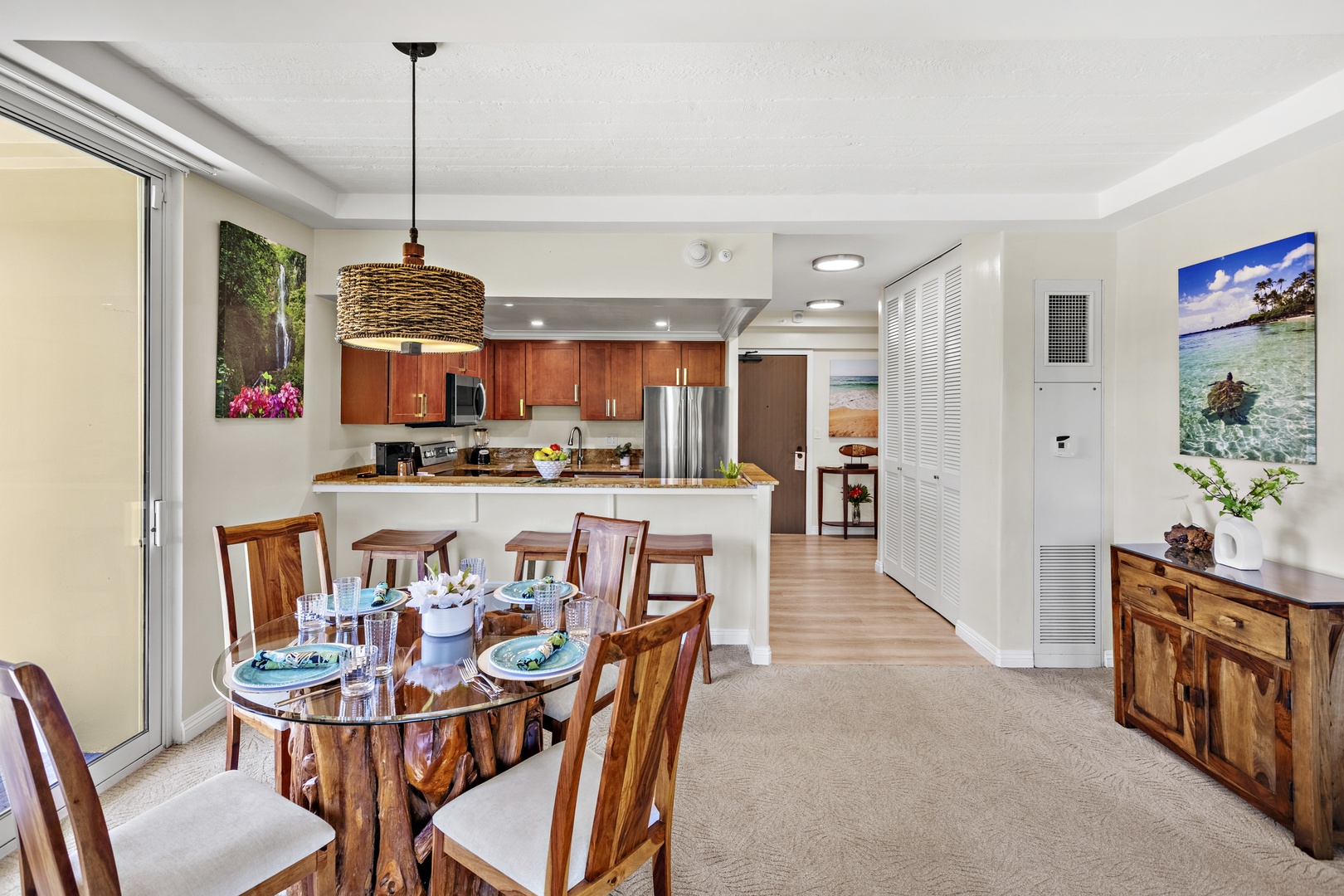 An inviting dining space where island elegance meets breathtaking ocean views. Gather around the beautifully set table, surrounded by warm textures, coastal-inspired décor, and soft ambient lighting.