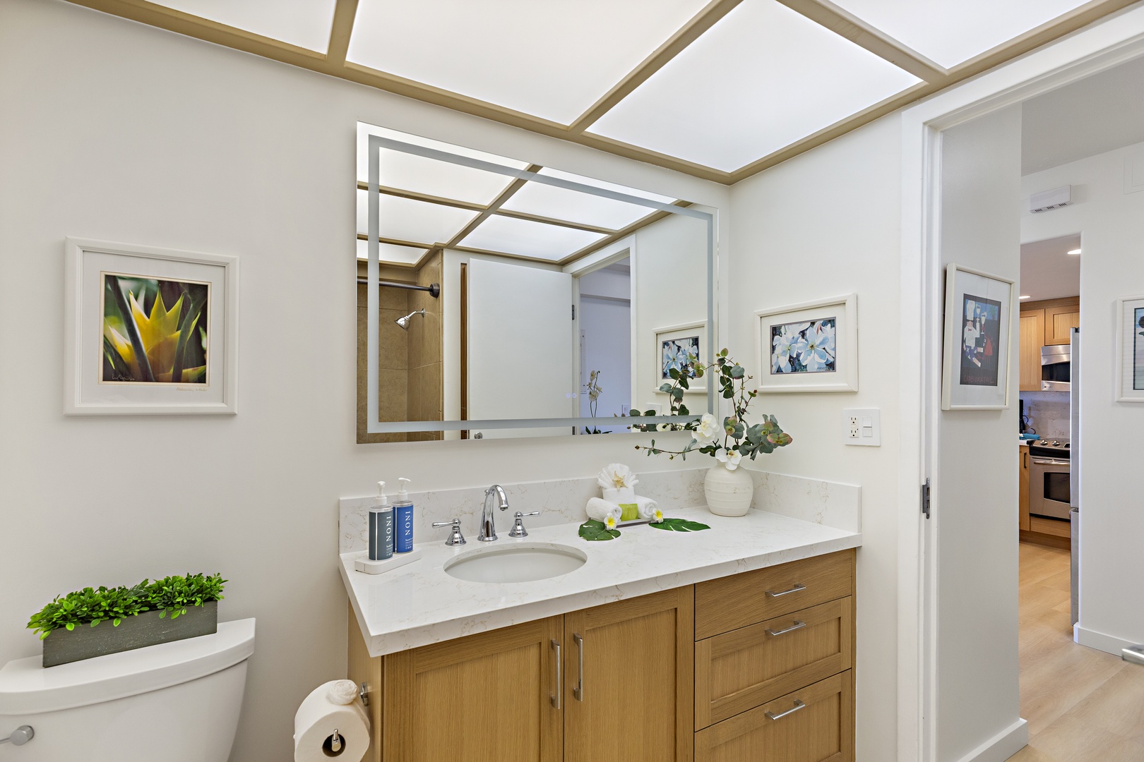Your bathroom offers serene spa-like comfort with bright natural light, a quartz vanity, and fresh, calming details that invite you to relax and refresh.