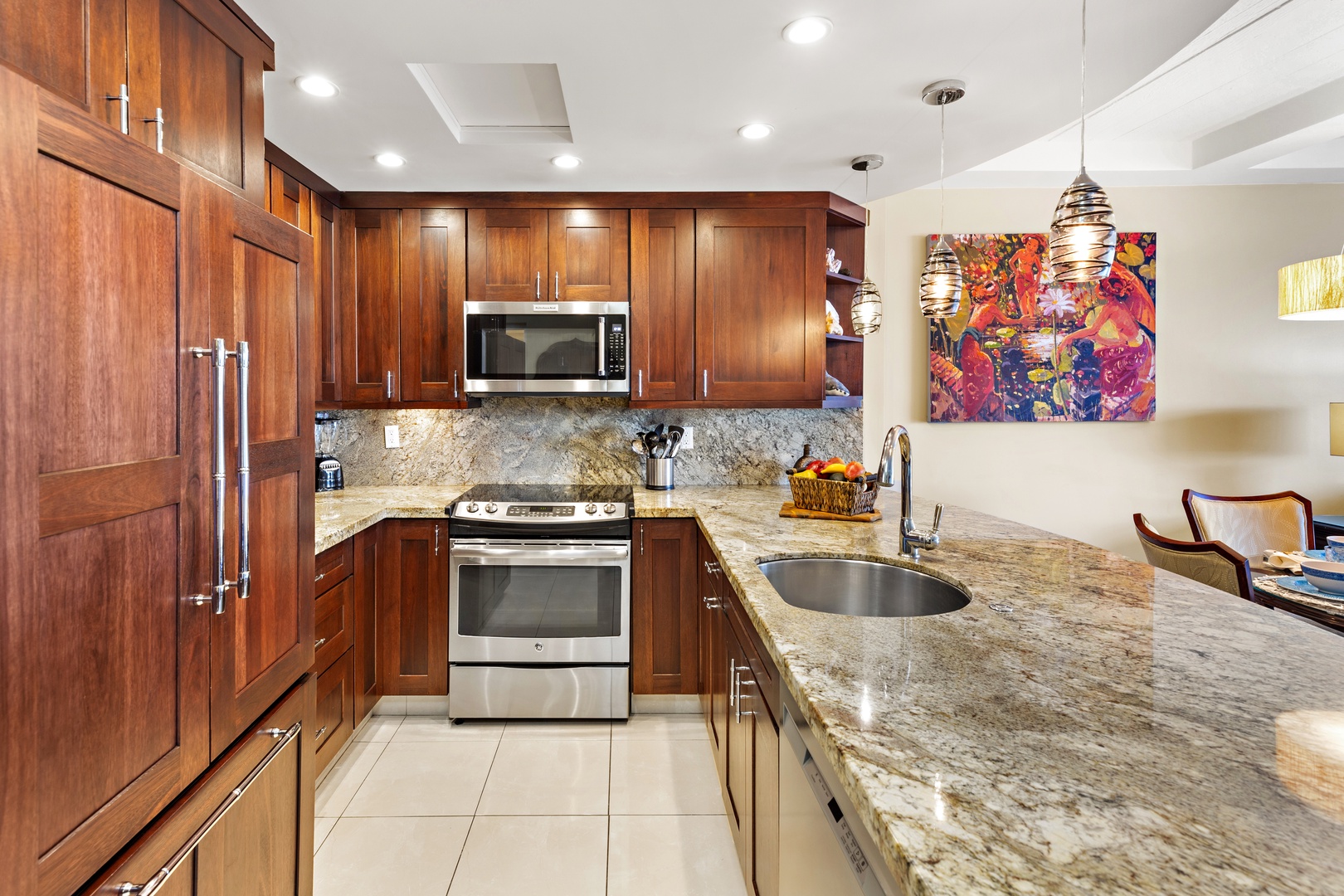 Your gourmet kitchen features rich wood cabinetry, granite countertops, and stainless steel appliances—everything you need to prepare a delicious meal or morning coffee in comfort.