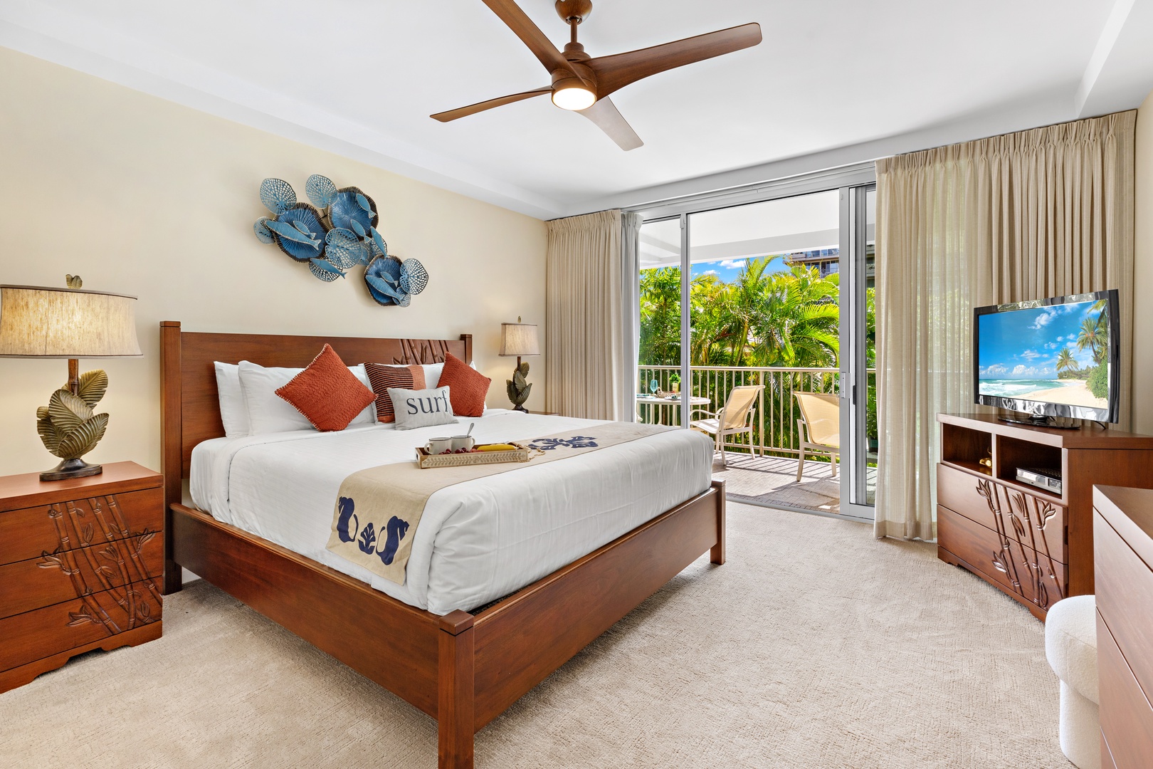 This bright, airy bedroom features a plush king-size bed for ultimate comfort, with direct access to a private balcony that blends indoor-outdoor island living in the heart of paradise