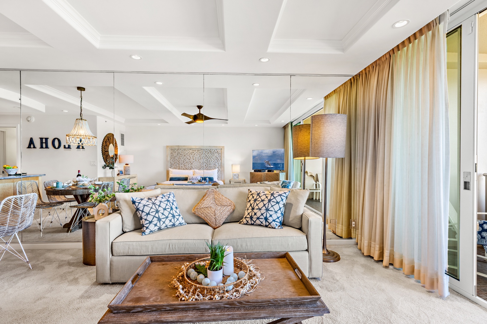 Step into a bright, beautifully styled living space with plush seating and coastal-inspired decor. Your retreat blends comfort and elegance, perfect for unwinding after a day of adventure.