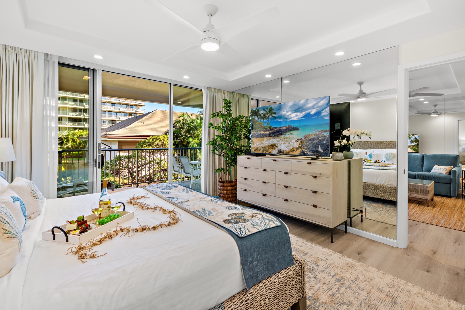 Wake up to island light and step straight out to sweeping resort views. This bright, airy bedroom features a plush king-size bed for ultimate comfort, with direct access to a private balcony that blends indoor-outdoor island living in the heart of paradis