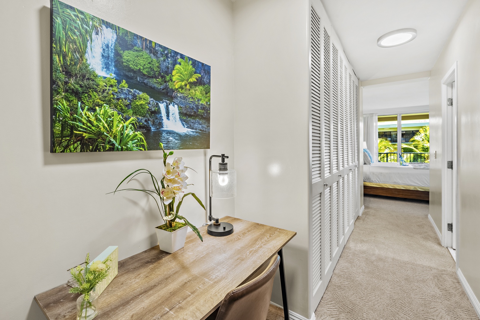 Inviting master bedroom entrance with clean decor, natural light, and a cozy atmosphere