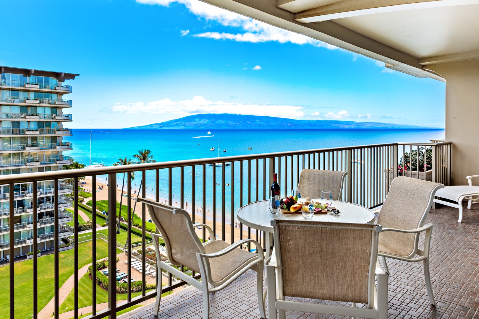 Start your mornings here with coffee and island views that stretch from turquoise waters to distant mountains. This private balcony is your front-row seat to paradise.