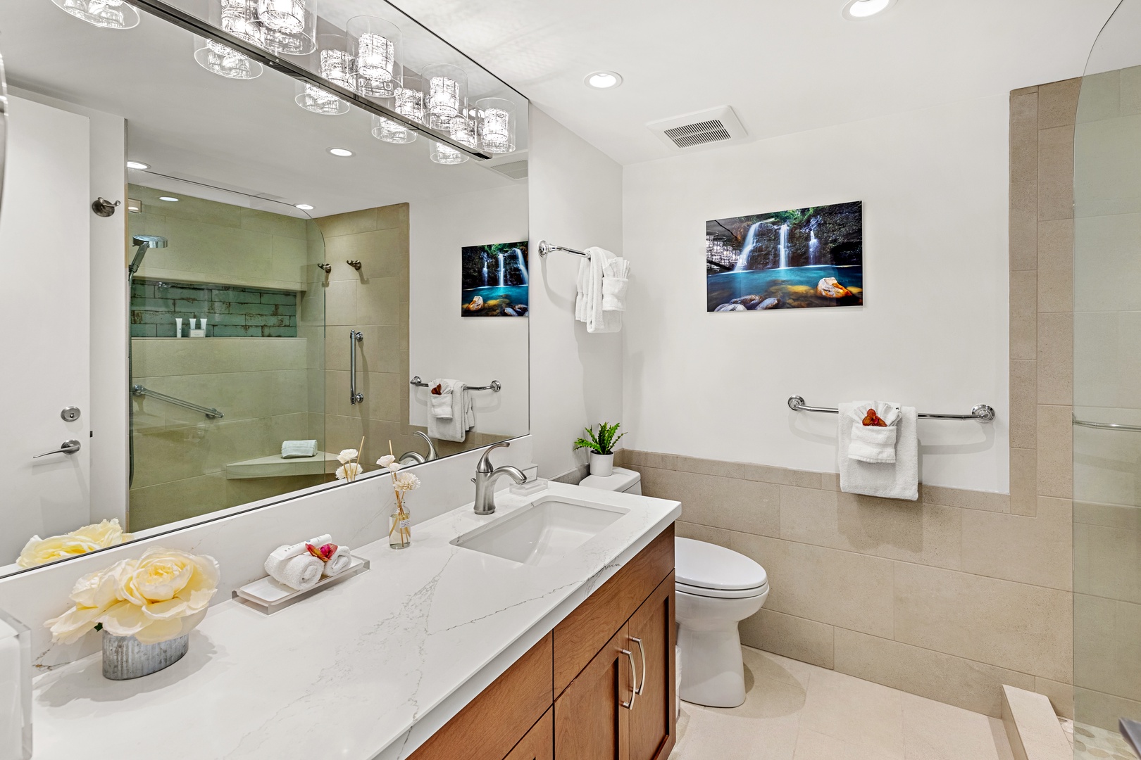 A private master bathroom designed for comfort and relaxation. Featuring elegant finishes, a spacious layout, and a calming atmosphere to start and end your day in island style