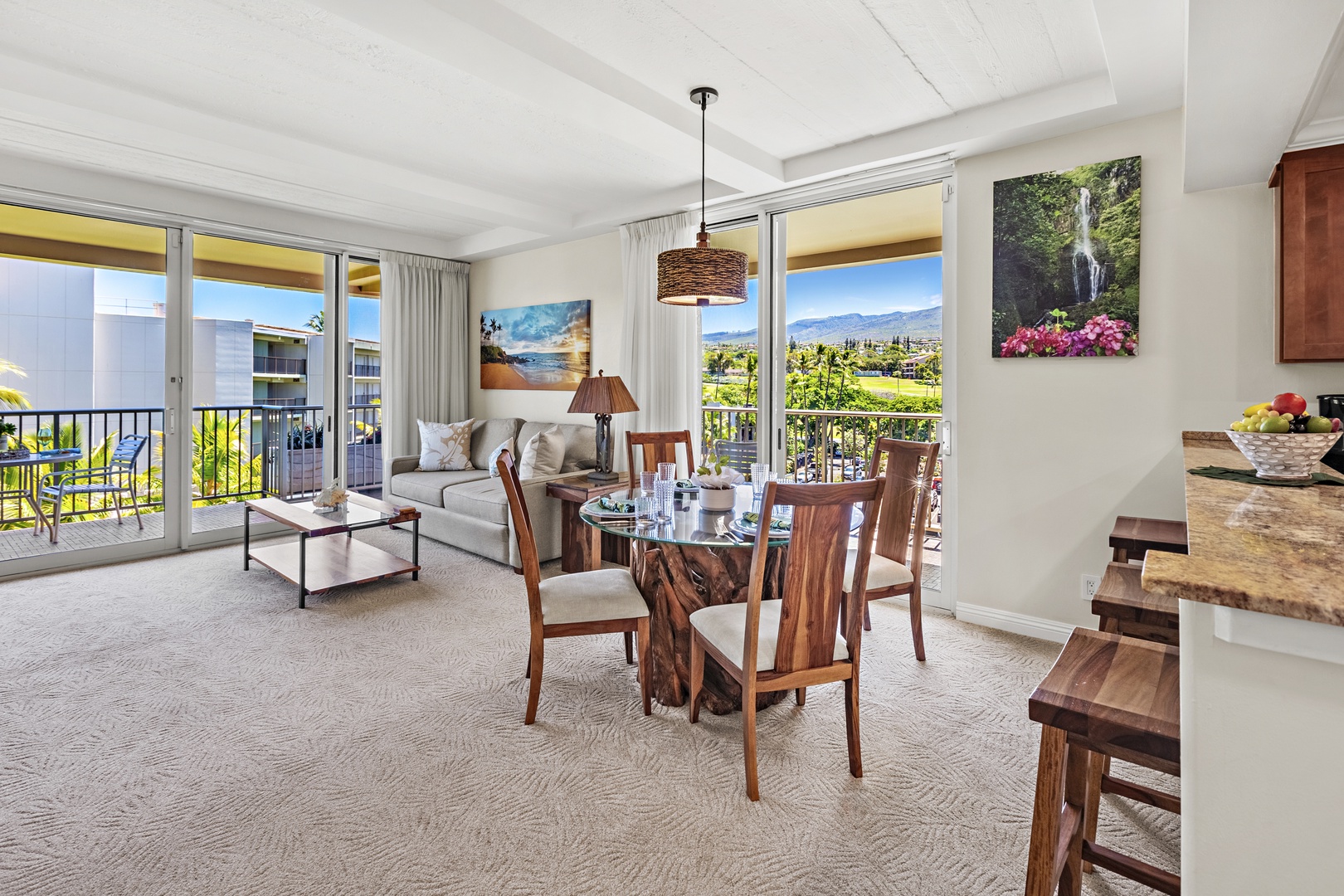 Unwind in a bright and welcoming living area, complete with a flat-screen TV and comfortable furnishings. Perfect for peaceful lounging.