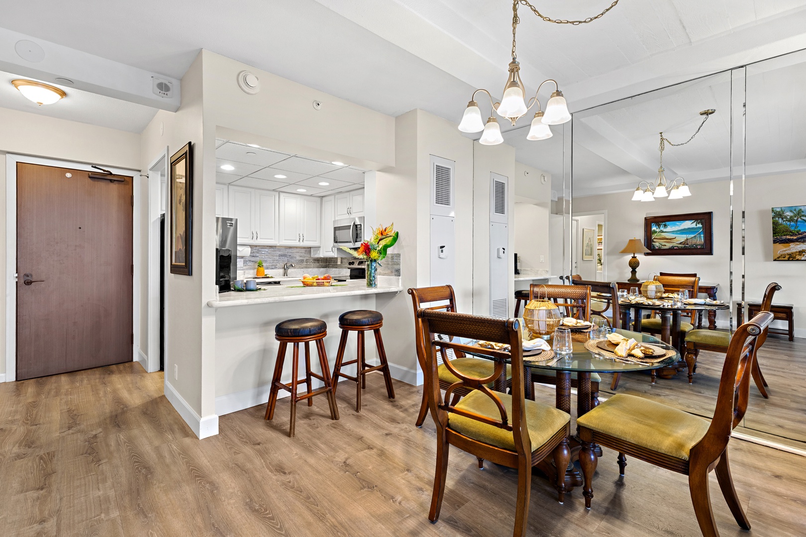 Gather around your elegant dining table with seating for eight, just steps from your open-concept kitchen where you'll whip up meals at modern appliances and a breakfast bar with cozy stools.