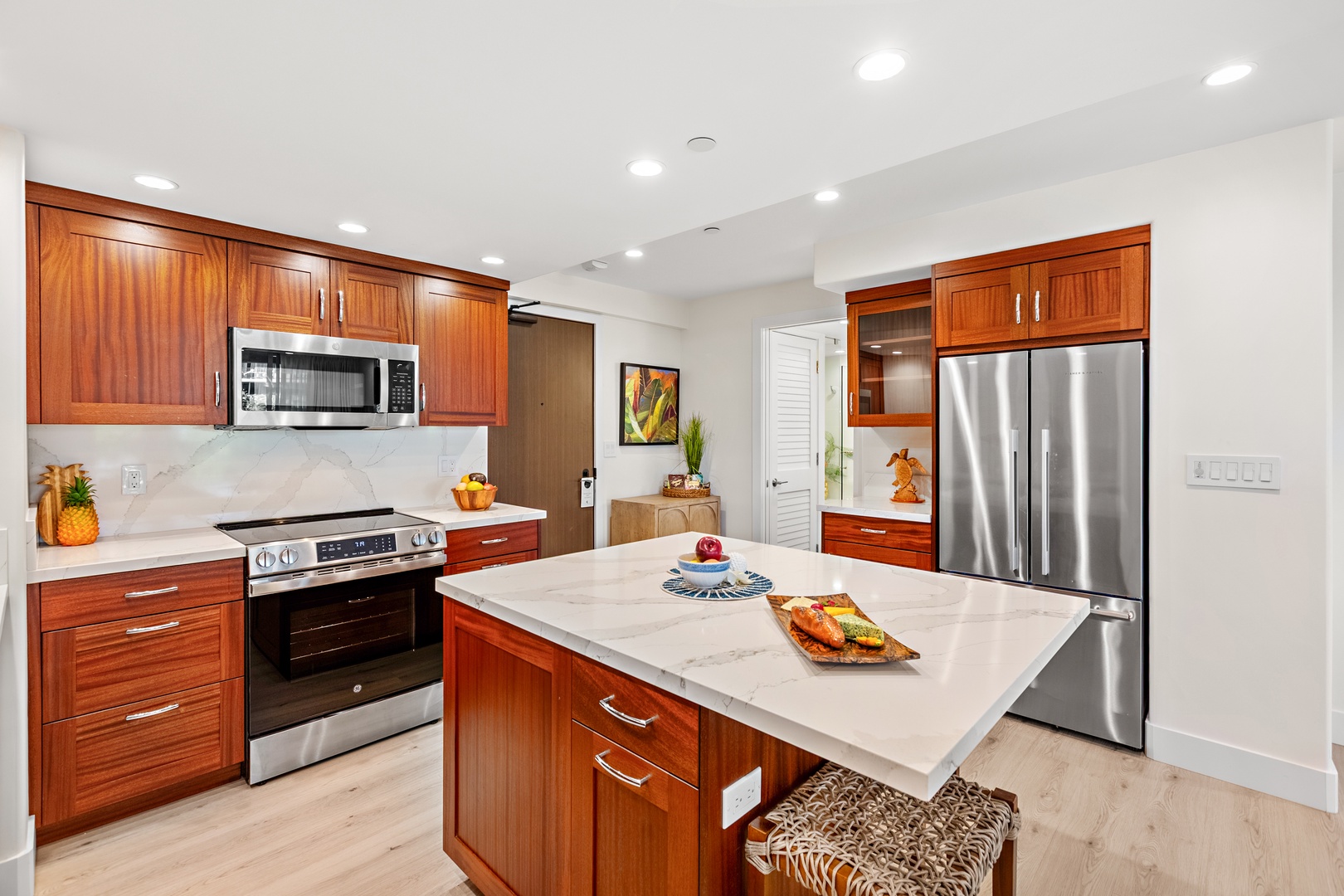 Cook with ease in a thoughtfully designed, fully equipped kitchen. Featuring modern appliances, ample counter space, and all the essentials you need, from quick island breakfasts to full home-cooked dinners.