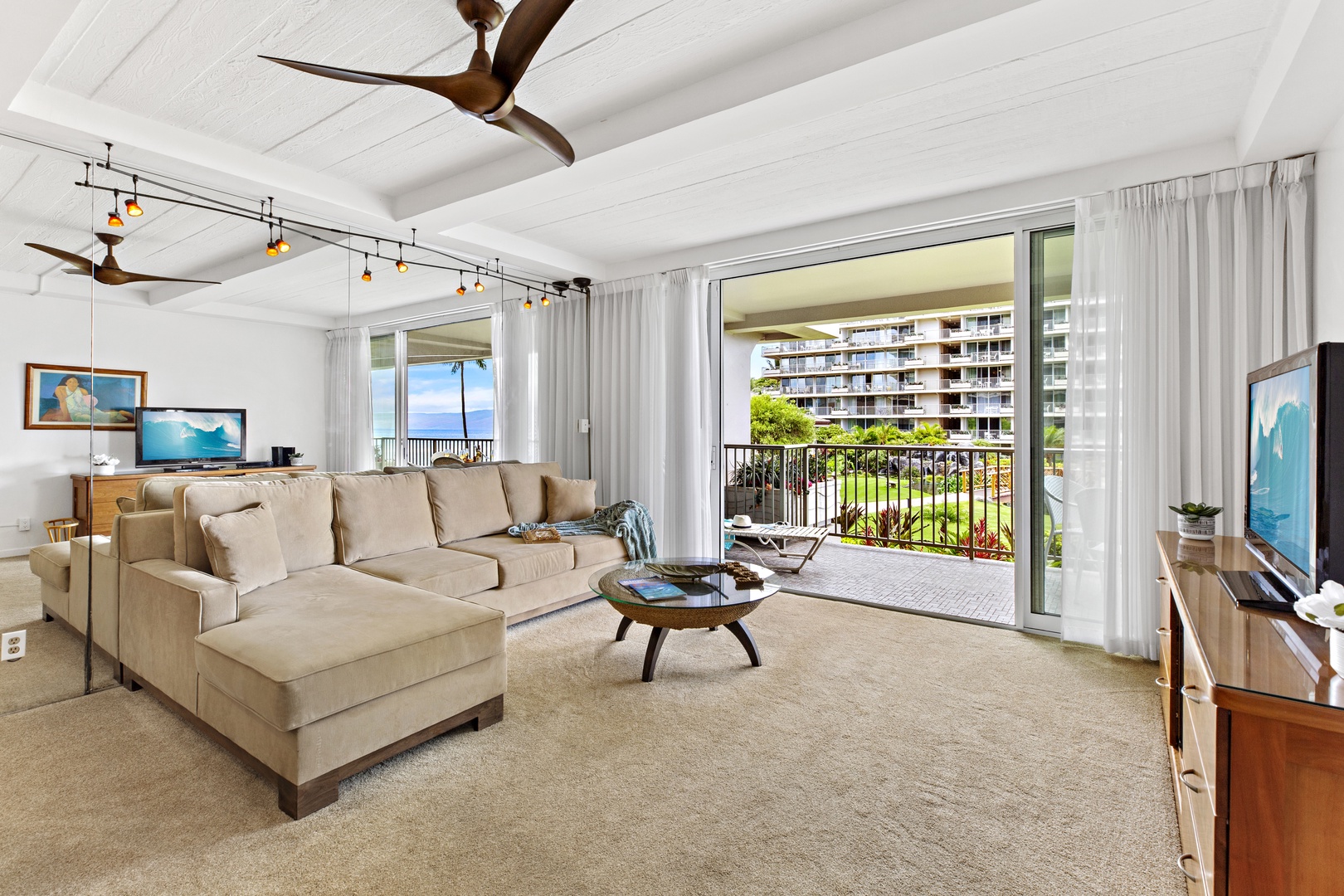 Sink into your plush sectional while ocean breezes flow through sliding doors to your private balcony.  Spacious living area featuring a comfortable pull-out sofa sleeper