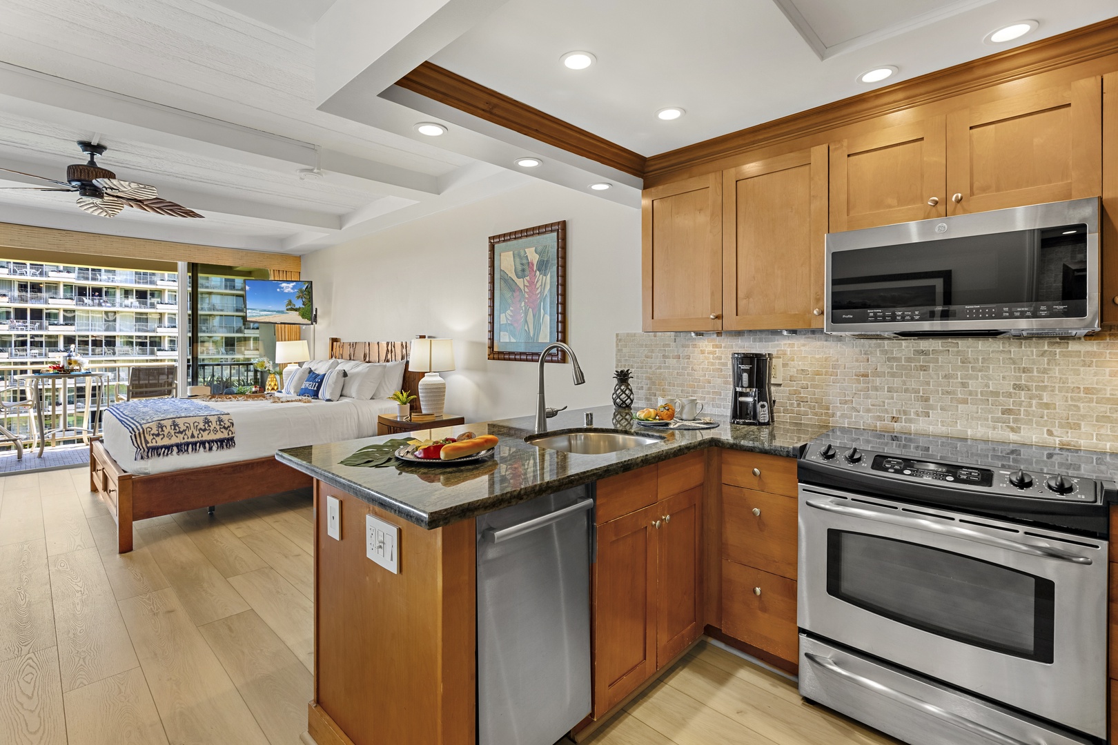 Your stylish open studio features a fully equipped kitchen with granite counters, perfect for cooking meals after exploring the city below.