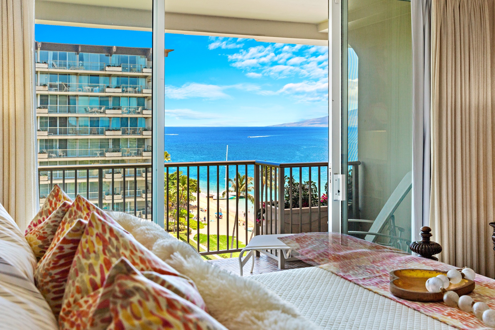 Wake up to stunning ocean views from your plush bed. Step onto your private balcony and breathe in the fresh sea air as waves sparkle beneath the sun.