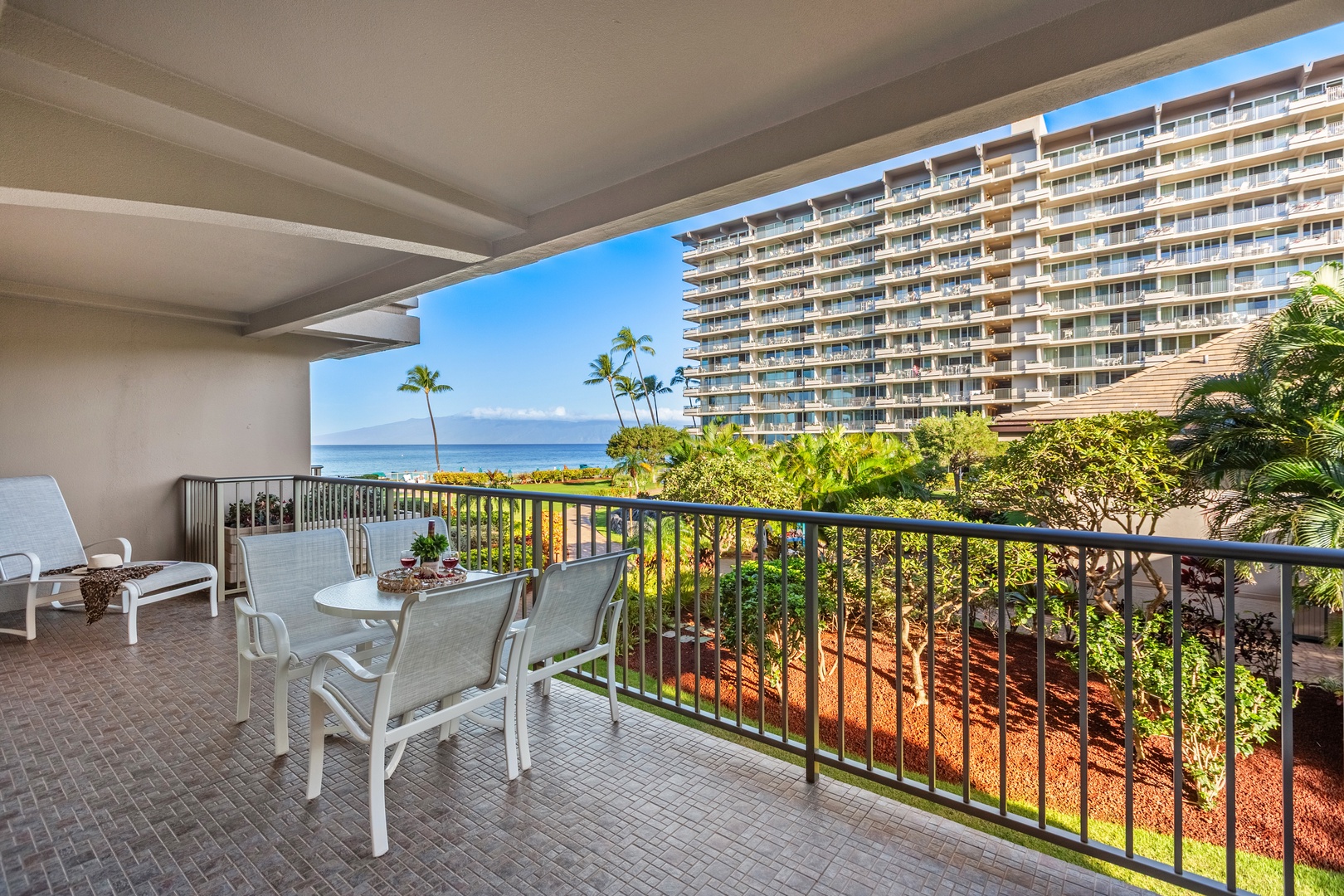 Indulge in serene poolside moments with picturesque views of Kā‘anapali Beach, where ocean blues and tropical beauty create an unforgettable backdrop.