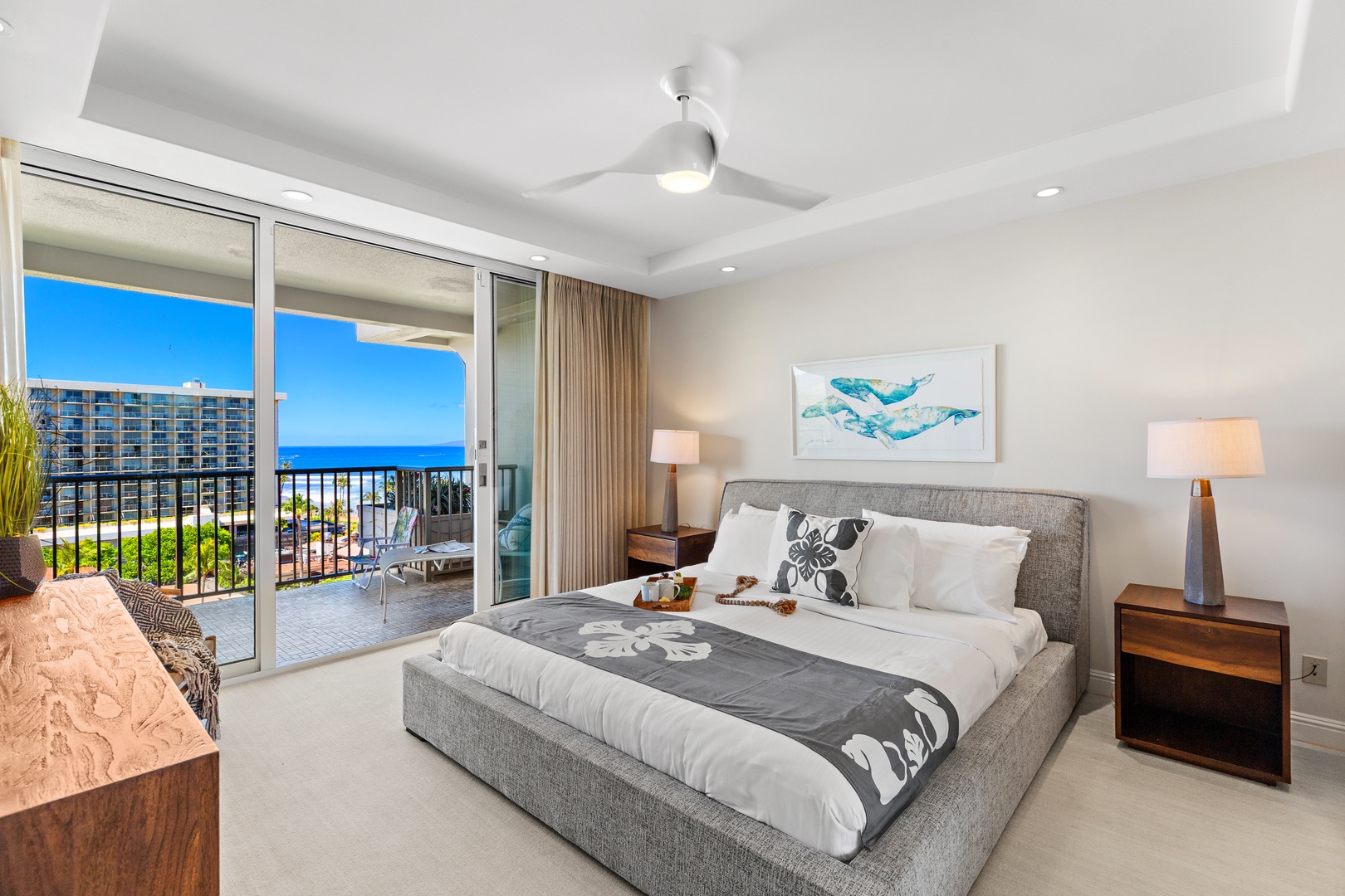 Wake up to stunning ocean views and drift off under coastal breezes. Your peaceful master suite blends modern comfort with tropical charm, opening to your private balcony overlooking the sea.