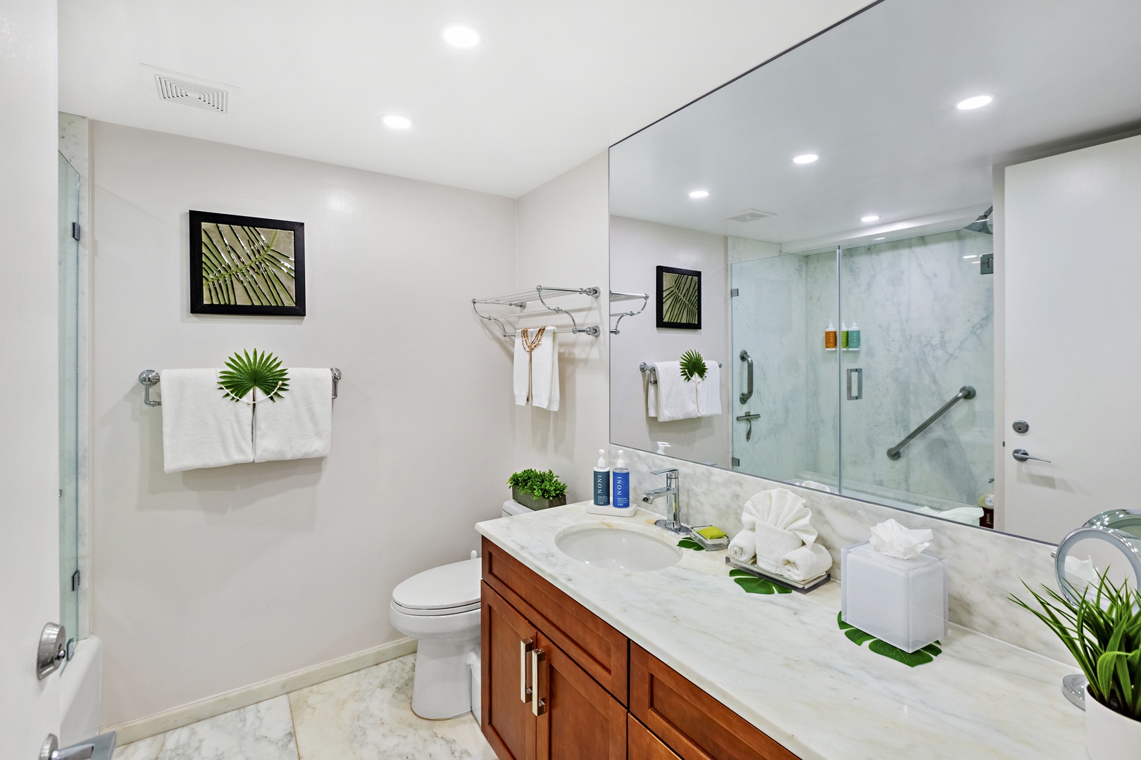 A private master bathroom designed for comfort and relaxation. Featuring elegant finishes, a spacious layout, and a calming atmosphere to start and end your day in island style
