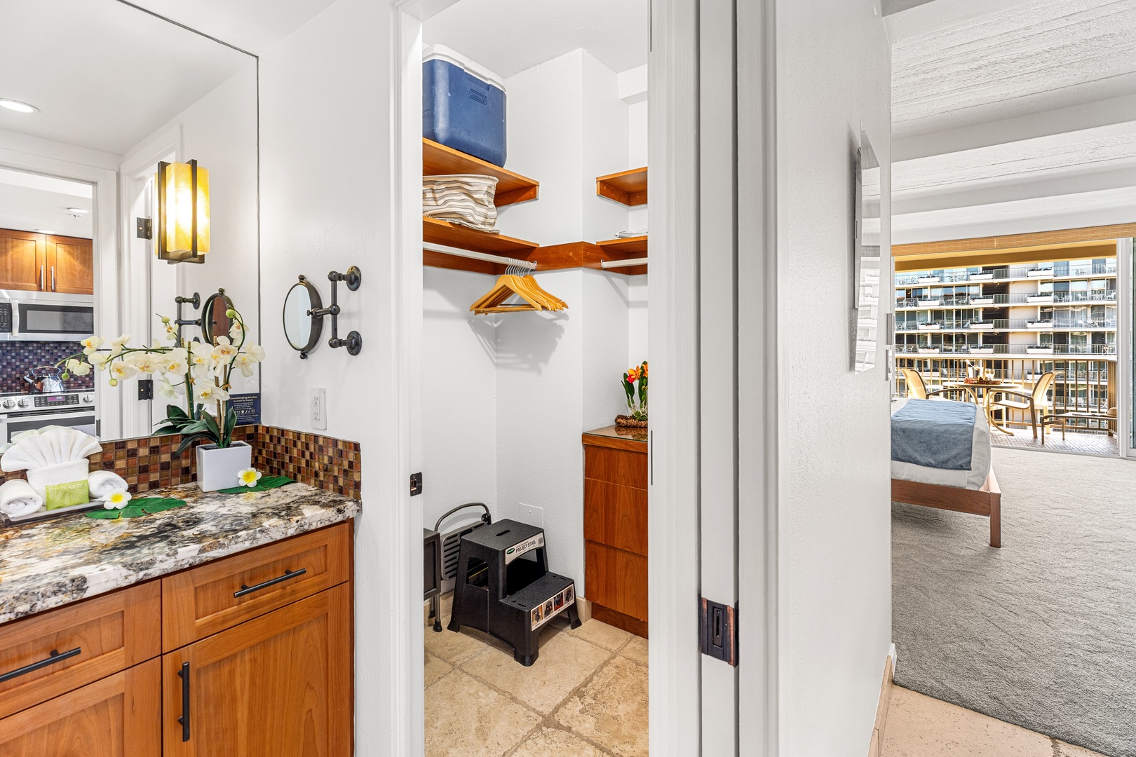 Step into your thoughtfully organized entry with built-in shelving, hooks, and plenty of storage to keep your vacation essentials tidy and within reach.